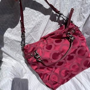 Authentic fuchsia Coach. Long strap. Two shorter straps on sides to carry high.